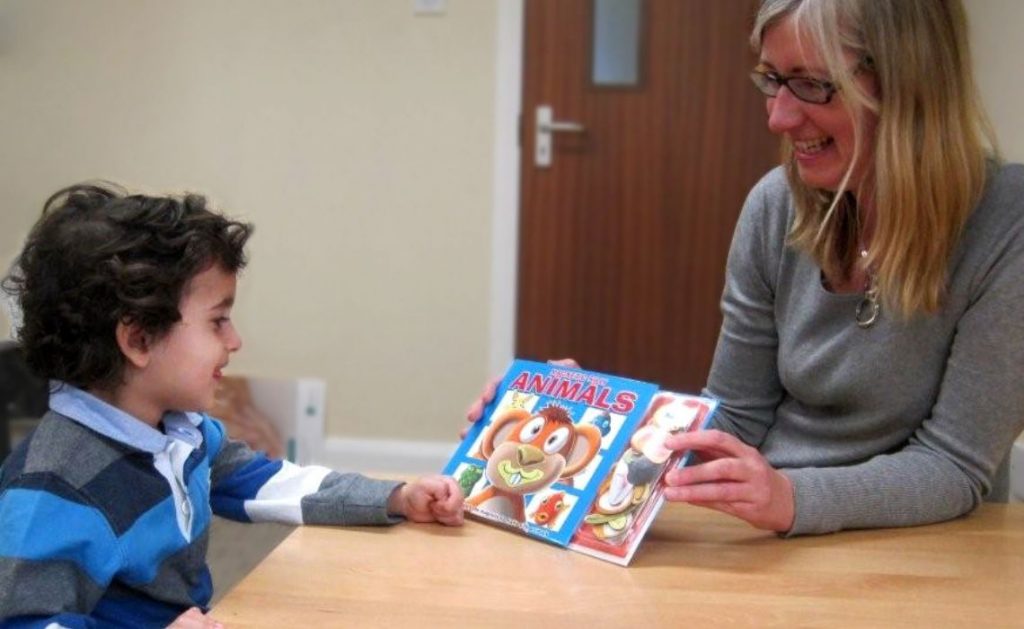 Anna Koppenhout using books to support speech and language. development with a child