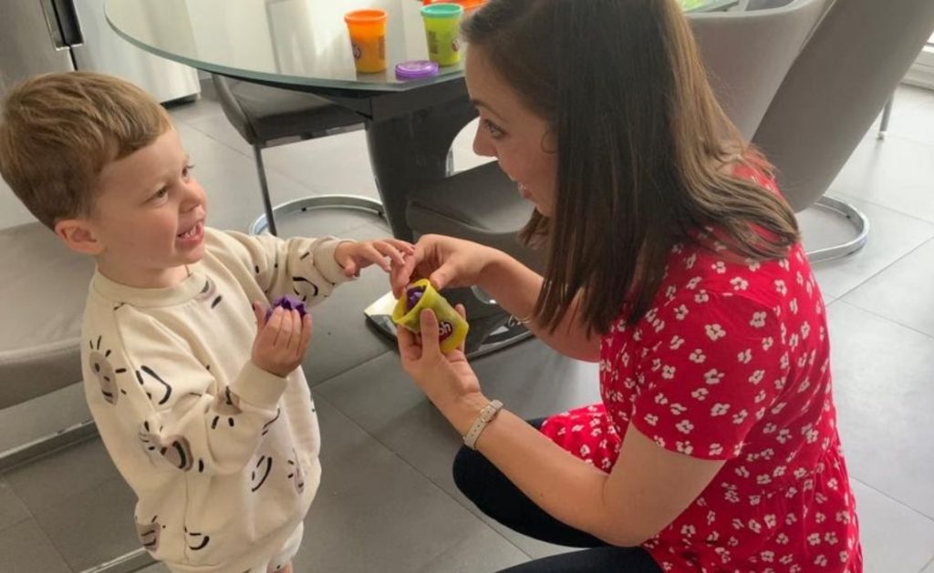 Elena Speech and language therapist working with child.